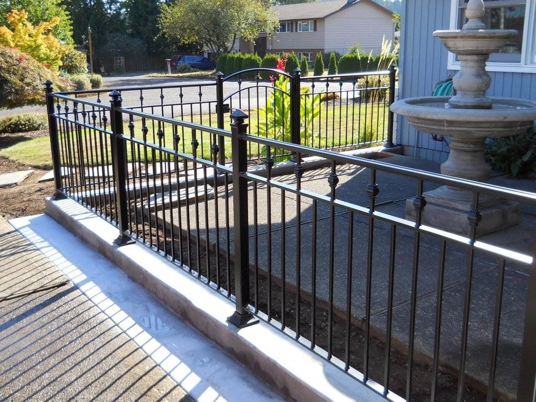 A fence that is made of metal.