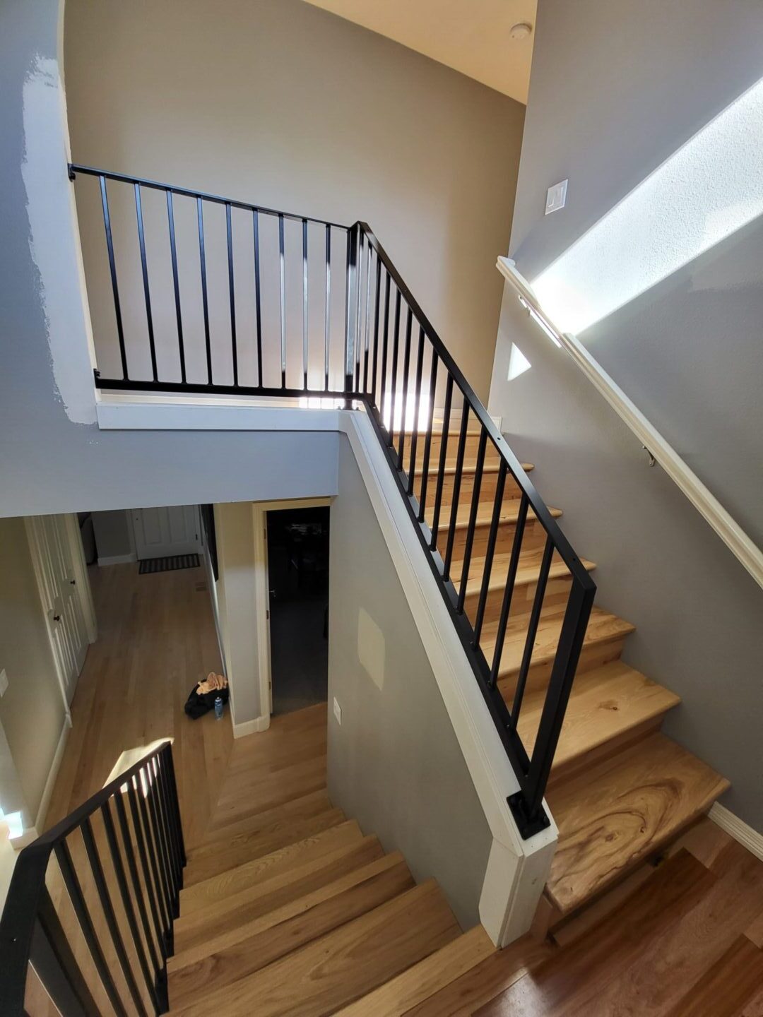 A view of the top floor stairs from above.